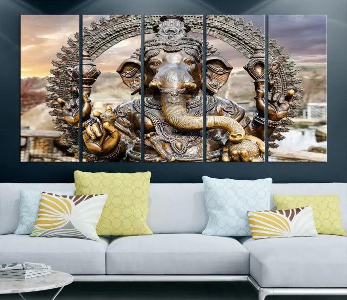 A Statue of Hindu Elephant God Ganesha Wall Art Canvas Print features a museum-quality canvas with a UV-protective coating and is ready to hang against a dark wall.