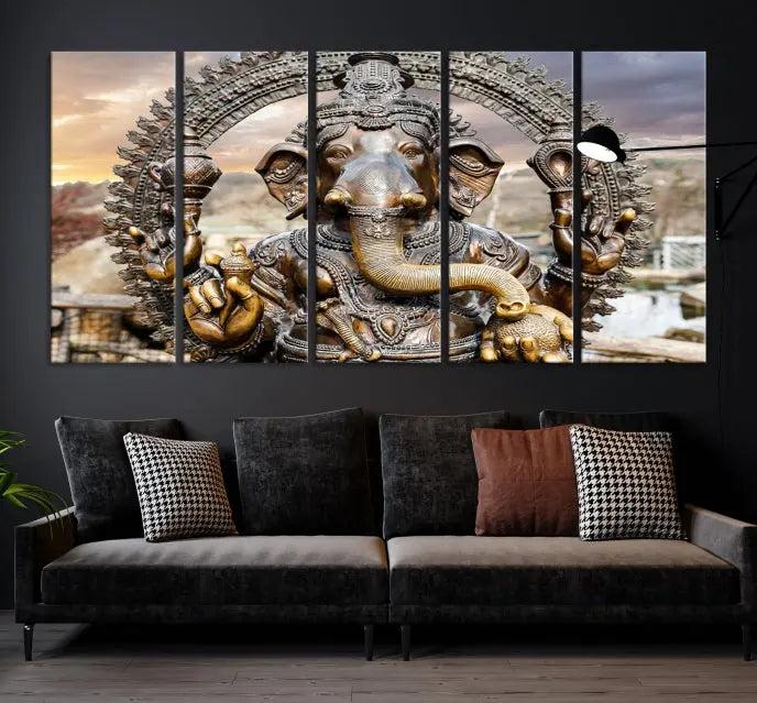 A Statue of Hindu Elephant God Ganesha Wall Art Canvas Print features a museum-quality canvas with a UV-protective coating and is ready to hang against a dark wall.