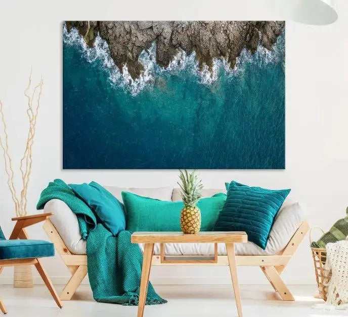 The wall is adorned with the Stone and Aerial Beach Wall Art Canvas Print, crafted by professional artisans, contributing an air of sophistication to the space.