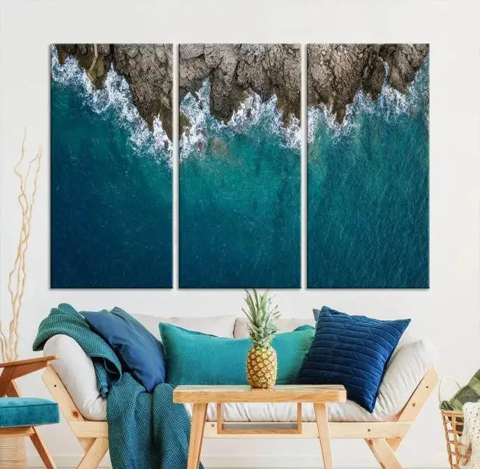 The wall is adorned with the Stone and Aerial Beach Wall Art Canvas Print, crafted by professional artisans, contributing an air of sophistication to the space.