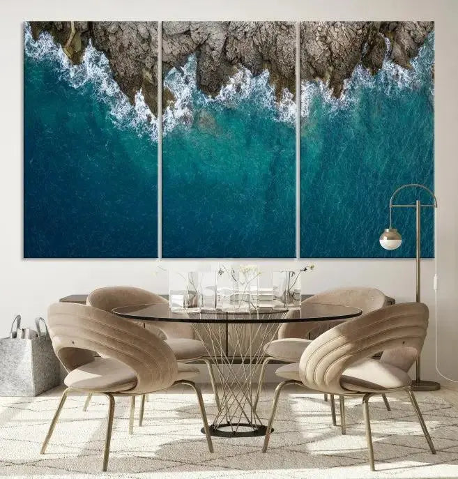 The wall is adorned with the Stone and Aerial Beach Wall Art Canvas Print, crafted by professional artisans, contributing an air of sophistication to the space.