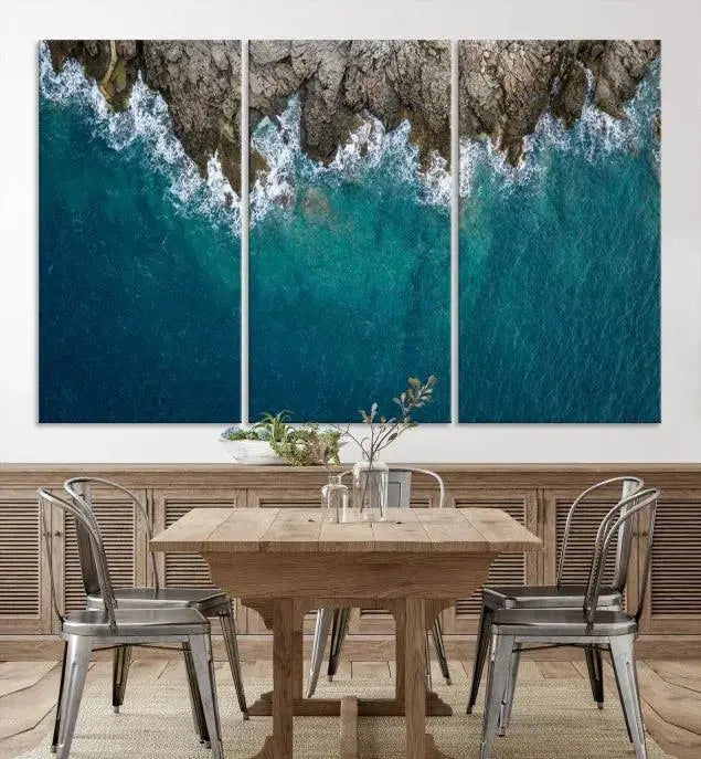 The wall is adorned with the Stone and Aerial Beach Wall Art Canvas Print, crafted by professional artisans, contributing an air of sophistication to the space.