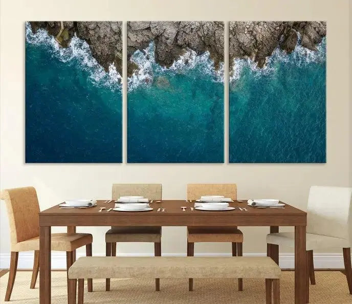 The wall is adorned with the Stone and Aerial Beach Wall Art Canvas Print, crafted by professional artisans, contributing an air of sophistication to the space.