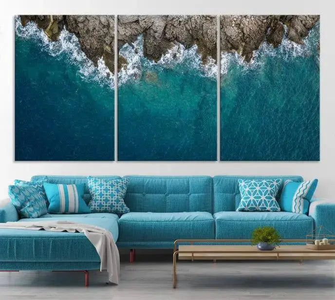 The wall is adorned with the Stone and Aerial Beach Wall Art Canvas Print, crafted by professional artisans, contributing an air of sophistication to the space.