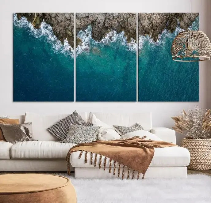 The wall is adorned with the Stone and Aerial Beach Wall Art Canvas Print, crafted by professional artisans, contributing an air of sophistication to the space.