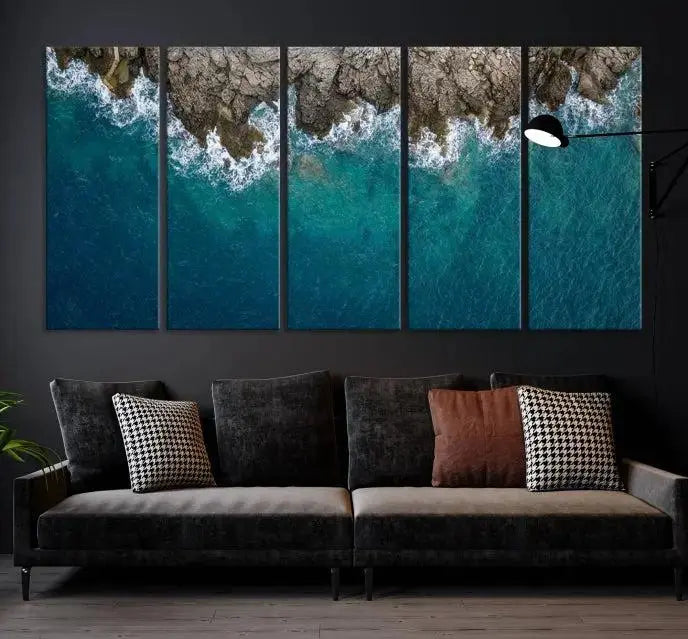 The wall is adorned with the Stone and Aerial Beach Wall Art Canvas Print, crafted by professional artisans, contributing an air of sophistication to the space.