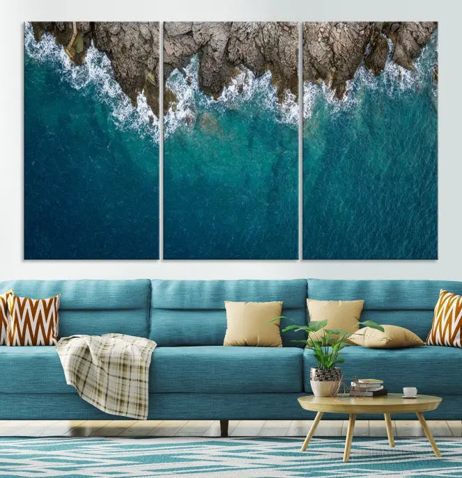 The wall is adorned with the Stone and Aerial Beach Wall Art Canvas Print, crafted by professional artisans, contributing an air of sophistication to the space.