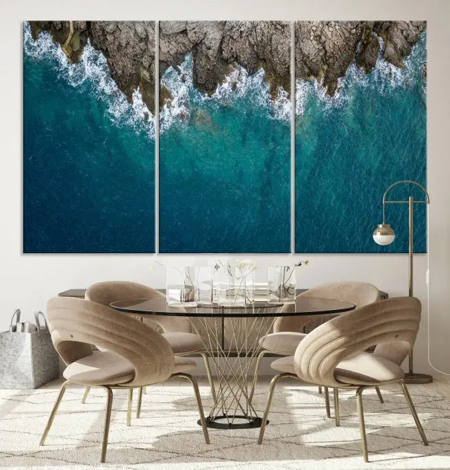 The wall is adorned with the Stone and Aerial Beach Wall Art Canvas Print, crafted by professional artisans, contributing an air of sophistication to the space.