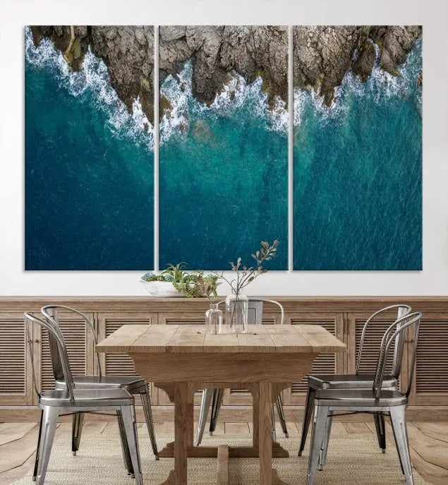 The wall is adorned with the Stone and Aerial Beach Wall Art Canvas Print, crafted by professional artisans, contributing an air of sophistication to the space.