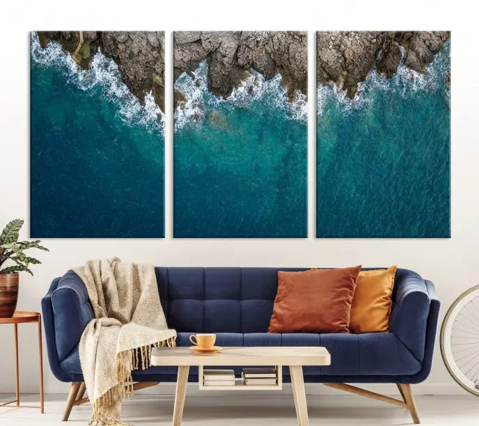 The wall is adorned with the Stone and Aerial Beach Wall Art Canvas Print, crafted by professional artisans, contributing an air of sophistication to the space.