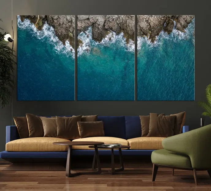 The wall is adorned with the Stone and Aerial Beach Wall Art Canvas Print, crafted by professional artisans, contributing an air of sophistication to the space.