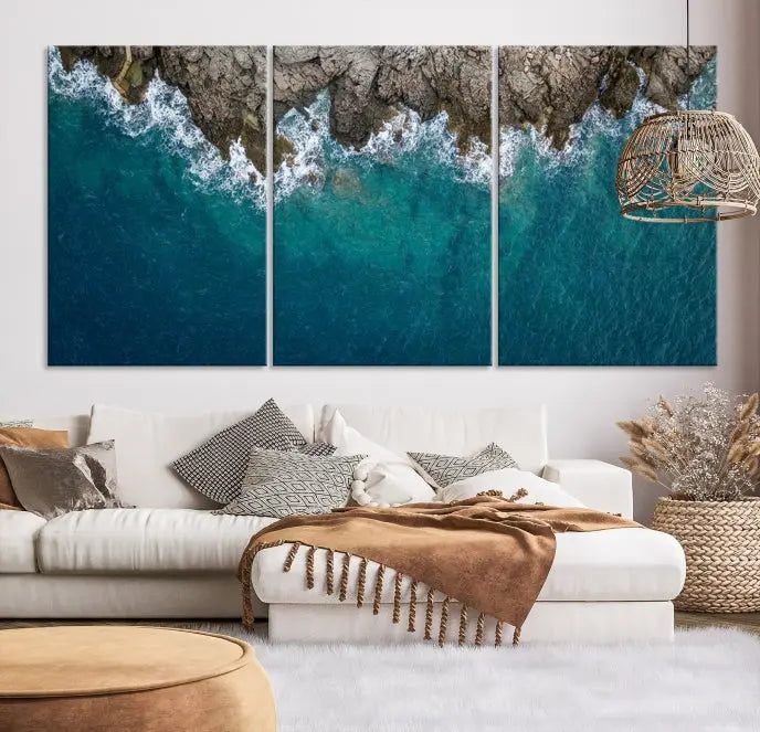 The wall is adorned with the Stone and Aerial Beach Wall Art Canvas Print, crafted by professional artisans, contributing an air of sophistication to the space.