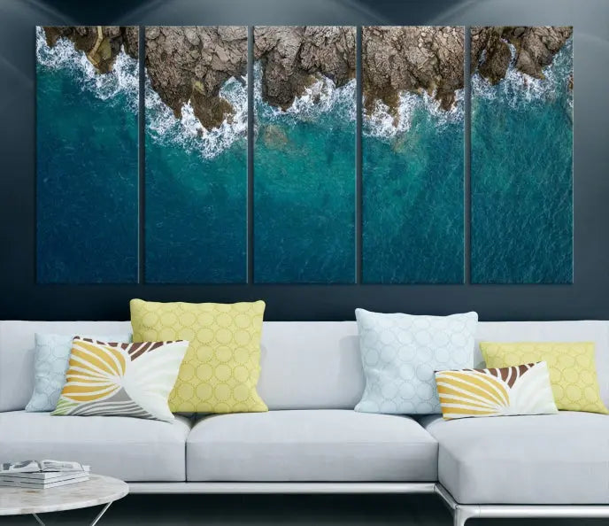 The wall is adorned with the Stone and Aerial Beach Wall Art Canvas Print, crafted by professional artisans, contributing an air of sophistication to the space.