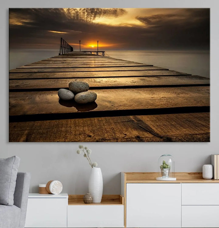 Stones on Wooden Pier at Sunset Canvas Print, Serene Coastal Wall Art, Beach Sunset Photography, Large Canvas for Living Room, Nature-Inspired Decor