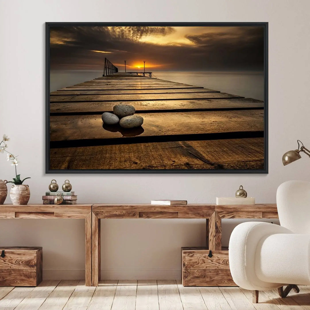 A Stones on Wooden Pier at Sunset canvas print featuring serene coastal art.