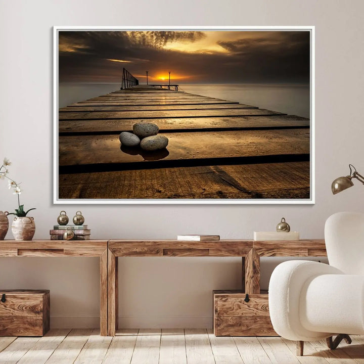 A Stones on Wooden Pier at Sunset canvas print featuring serene coastal art.