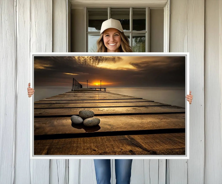 A Stones on Wooden Pier at Sunset canvas print featuring serene coastal art.