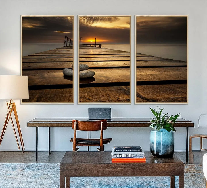 A Stones on Wooden Pier at Sunset canvas print featuring serene coastal art.
