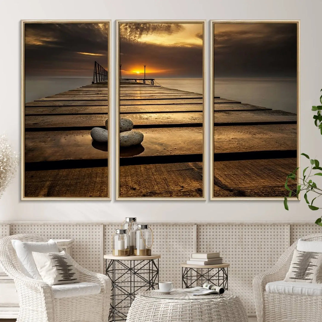 A Stones on Wooden Pier at Sunset canvas print featuring serene coastal art.