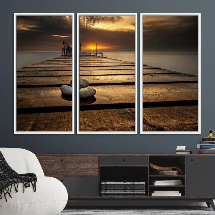 A Stones on Wooden Pier at Sunset canvas print featuring serene coastal art.