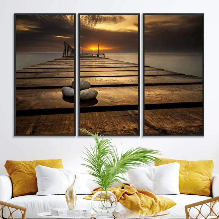 A Stones on Wooden Pier at Sunset canvas print featuring serene coastal art.