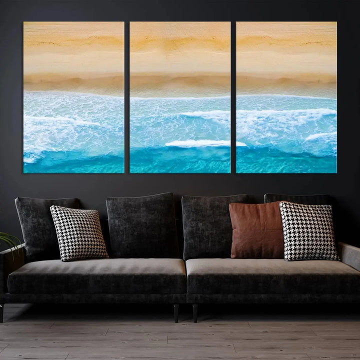 The Stunning Aerial Beach Canvas Print Wall Art, depicting turquoise waves and golden sand, is printed on museum-quality canvas.