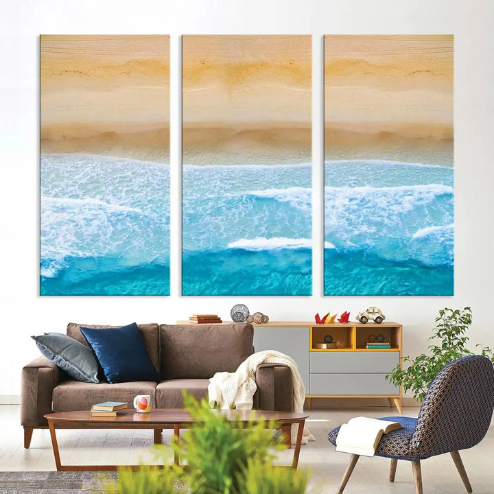 The Stunning Aerial Beach Canvas Print Wall Art, depicting turquoise waves and golden sand, is printed on museum-quality canvas.