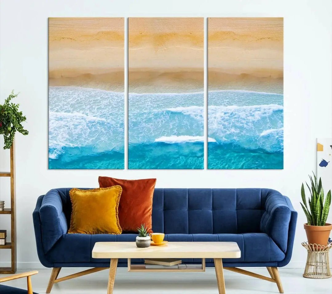 The Stunning Aerial Beach Canvas Print Wall Art, depicting turquoise waves and golden sand, is printed on museum-quality canvas.