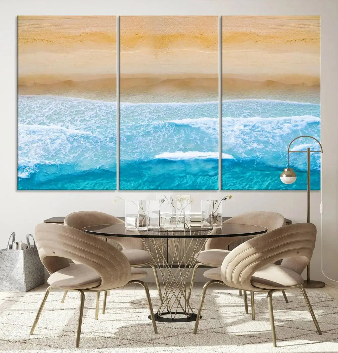 The Stunning Aerial Beach Canvas Print Wall Art, depicting turquoise waves and golden sand, is printed on museum-quality canvas.