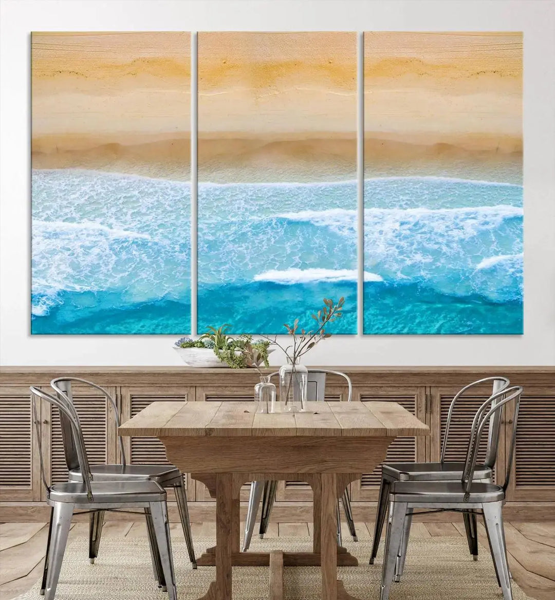 The Stunning Aerial Beach Canvas Print Wall Art, depicting turquoise waves and golden sand, is printed on museum-quality canvas.