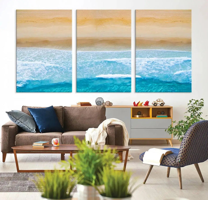 The Stunning Aerial Beach Canvas Print Wall Art, depicting turquoise waves and golden sand, is printed on museum-quality canvas.