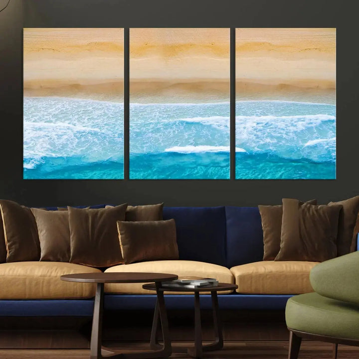 The Stunning Aerial Beach Canvas Print Wall Art, depicting turquoise waves and golden sand, is printed on museum-quality canvas.