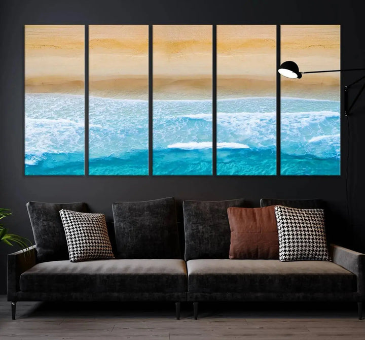 The Stunning Aerial Beach Canvas Print Wall Art, depicting turquoise waves and golden sand, is printed on museum-quality canvas.