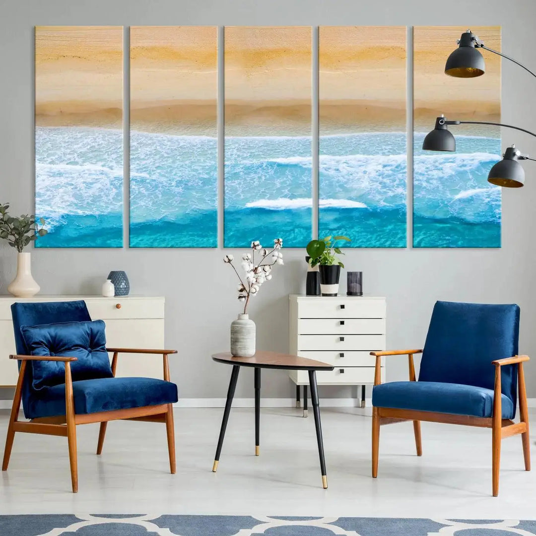 The Stunning Aerial Beach Canvas Print Wall Art, depicting turquoise waves and golden sand, is printed on museum-quality canvas.