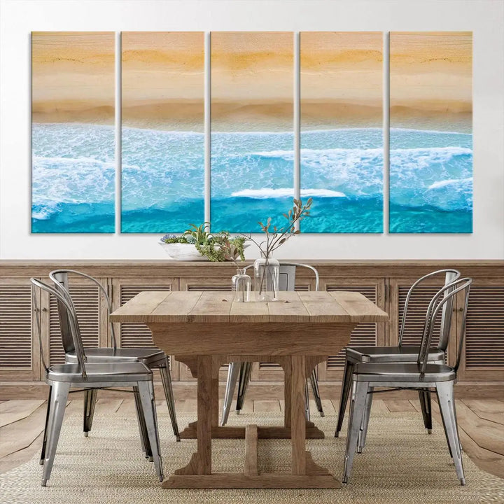 The Stunning Aerial Beach Canvas Print Wall Art, depicting turquoise waves and golden sand, is printed on museum-quality canvas.