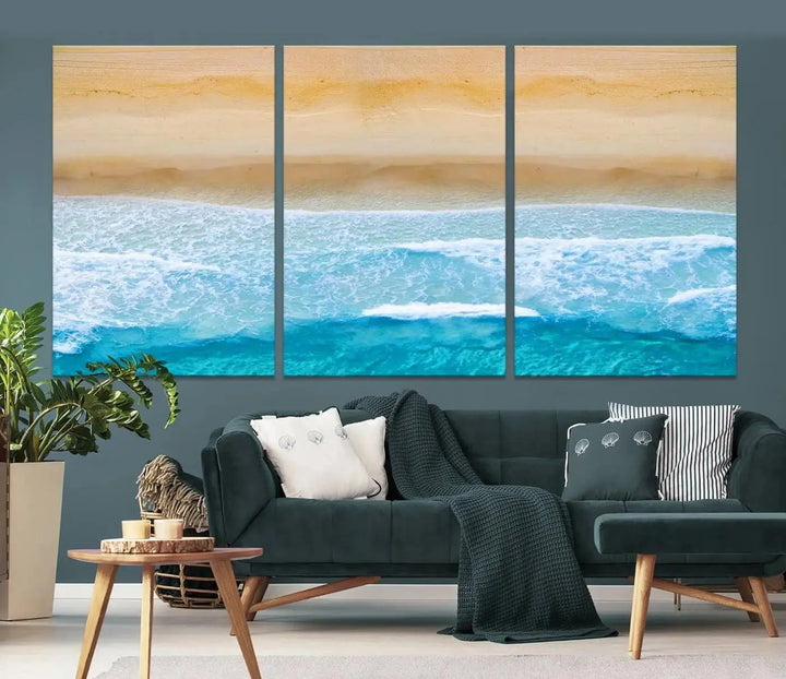 The Stunning Aerial Beach Canvas Print Wall Art, depicting turquoise waves and golden sand, is printed on museum-quality canvas.