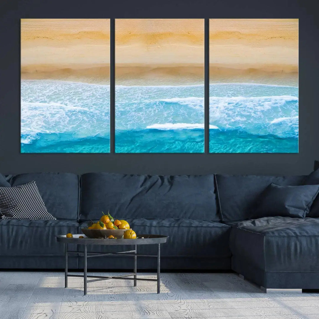 The Stunning Aerial Beach Canvas Print Wall Art, depicting turquoise waves and golden sand, is printed on museum-quality canvas.