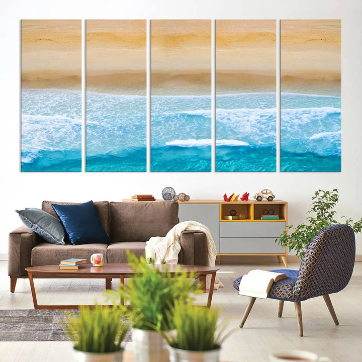 The Stunning Aerial Beach Canvas Print Wall Art, depicting turquoise waves and golden sand, is printed on museum-quality canvas.