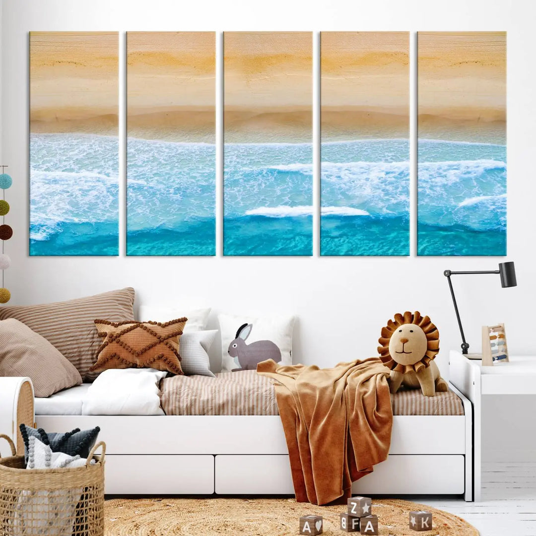 The Stunning Aerial Beach Canvas Print Wall Art, depicting turquoise waves and golden sand, is printed on museum-quality canvas.