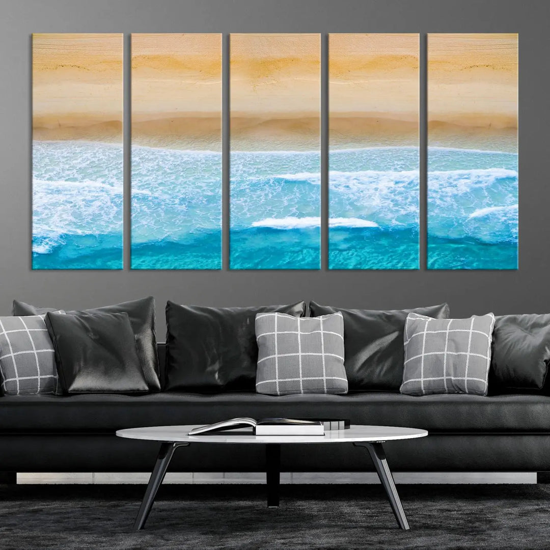 The Stunning Aerial Beach Canvas Print Wall Art, depicting turquoise waves and golden sand, is printed on museum-quality canvas.