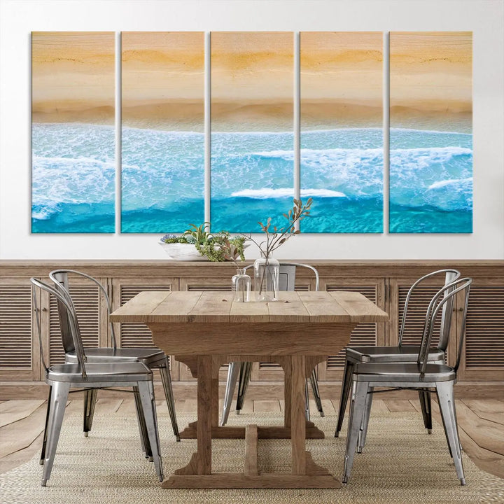 The Stunning Aerial Beach Canvas Print Wall Art, depicting turquoise waves and golden sand, is printed on museum-quality canvas.