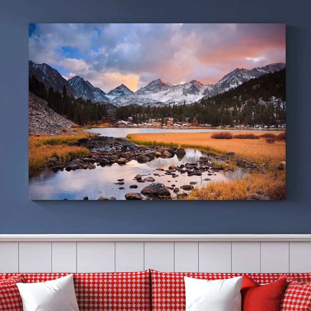 The living room features the Stunning Mountain Landscape Canvas Wall Art Print, a museum-quality triptych painting on UV-protective canvas that depicts majestic mountains and a serene river.