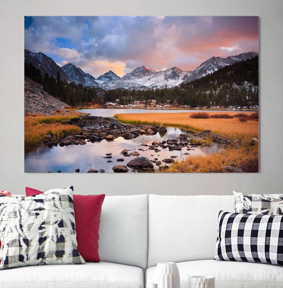 The living room features the Stunning Mountain Landscape Canvas Wall Art Print, a museum-quality triptych painting on UV-protective canvas that depicts majestic mountains and a serene river.