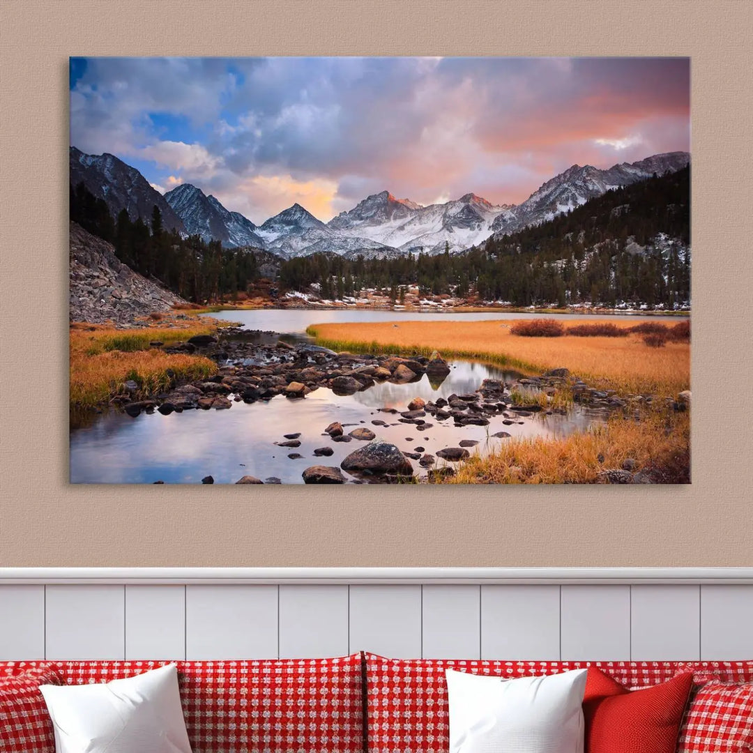 The living room features the Stunning Mountain Landscape Canvas Wall Art Print, a museum-quality triptych painting on UV-protective canvas that depicts majestic mountains and a serene river.