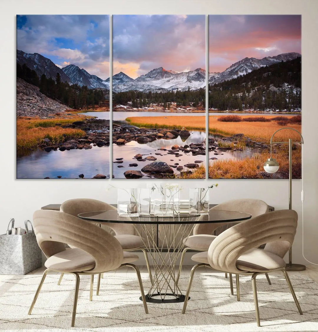 The living room features the Stunning Mountain Landscape Canvas Wall Art Print, a museum-quality triptych painting on UV-protective canvas that depicts majestic mountains and a serene river.