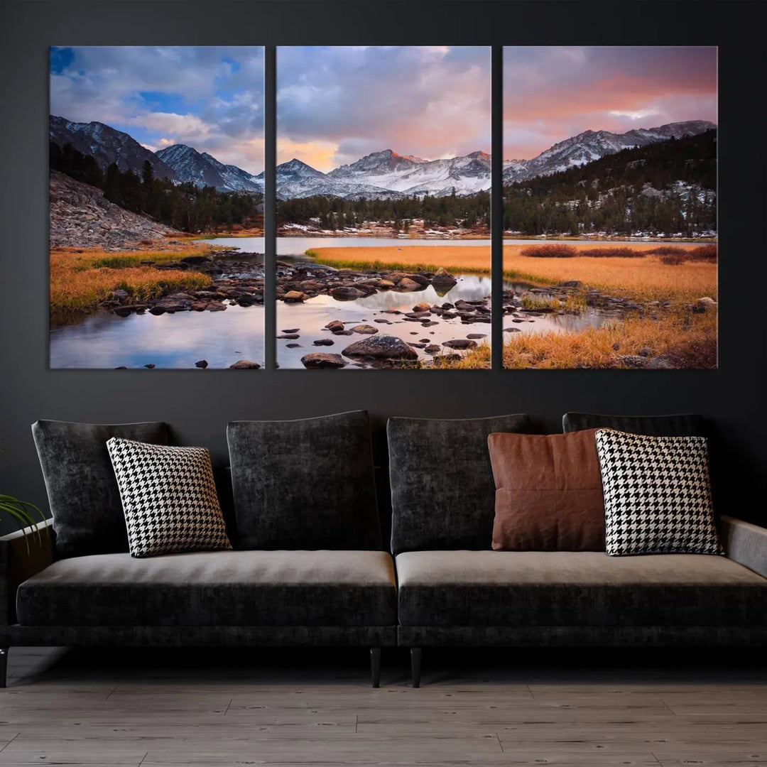 The living room features the Stunning Mountain Landscape Canvas Wall Art Print, a museum-quality triptych painting on UV-protective canvas that depicts majestic mountains and a serene river.