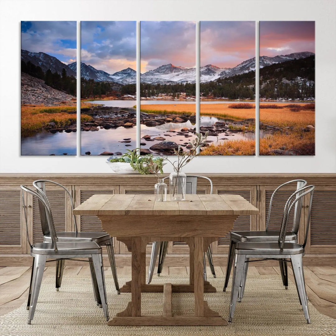 The living room features the Stunning Mountain Landscape Canvas Wall Art Print, a museum-quality triptych painting on UV-protective canvas that depicts majestic mountains and a serene river.