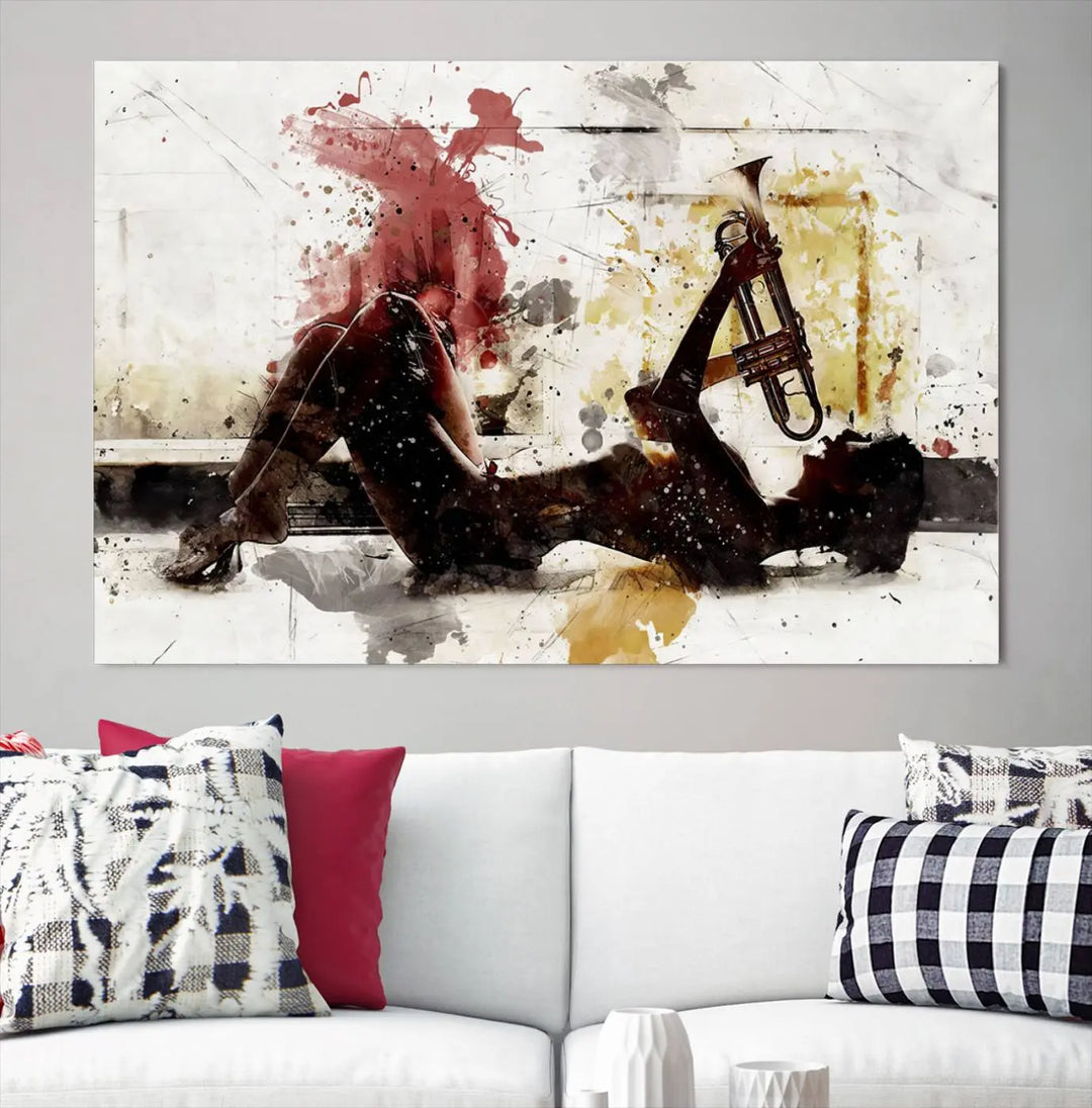 Introducing the Stylish Jazz Woman with Trumpet Triptych Canvas Art: This modern abstract wall décor features a captivating painting of a person lying with a trumpet, set against an abstract background with dynamic red and yellow splashes. This triptych artwork beautifully captures the essence of music and emotion in vibrant colors.