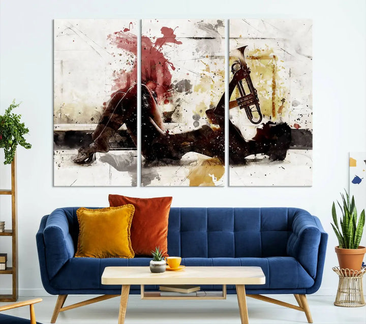 Introducing the Stylish Jazz Woman with Trumpet Triptych Canvas Art: This modern abstract wall décor features a captivating painting of a person lying with a trumpet, set against an abstract background with dynamic red and yellow splashes. This triptych artwork beautifully captures the essence of music and emotion in vibrant colors.