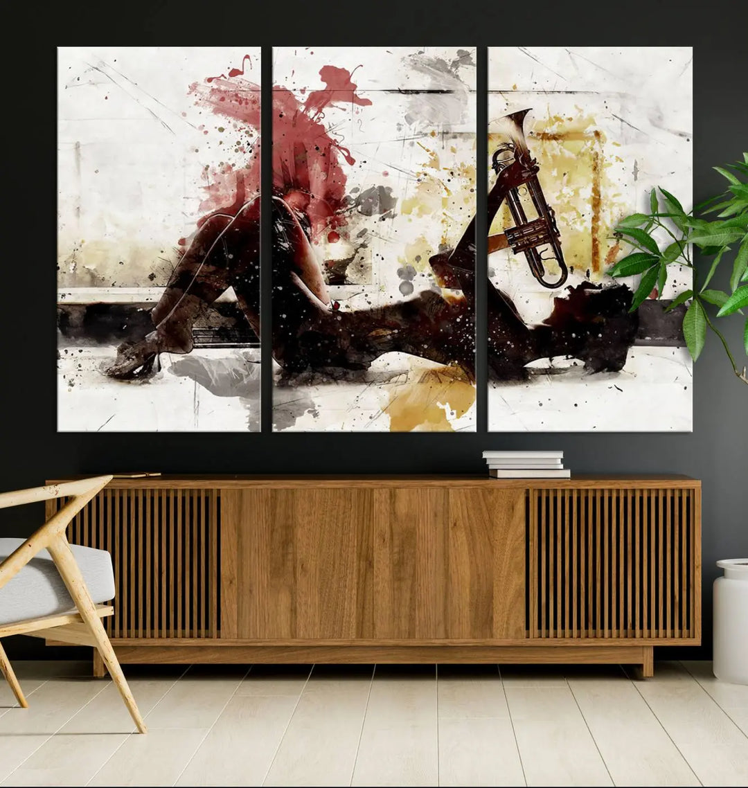 Introducing the Stylish Jazz Woman with Trumpet Triptych Canvas Art: This modern abstract wall décor features a captivating painting of a person lying with a trumpet, set against an abstract background with dynamic red and yellow splashes. This triptych artwork beautifully captures the essence of music and emotion in vibrant colors.